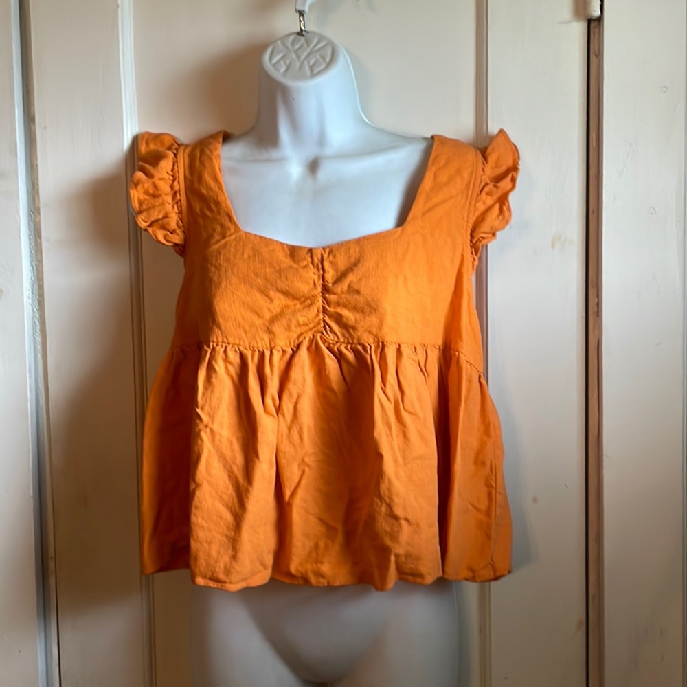 Orange flutter sleeve top size large